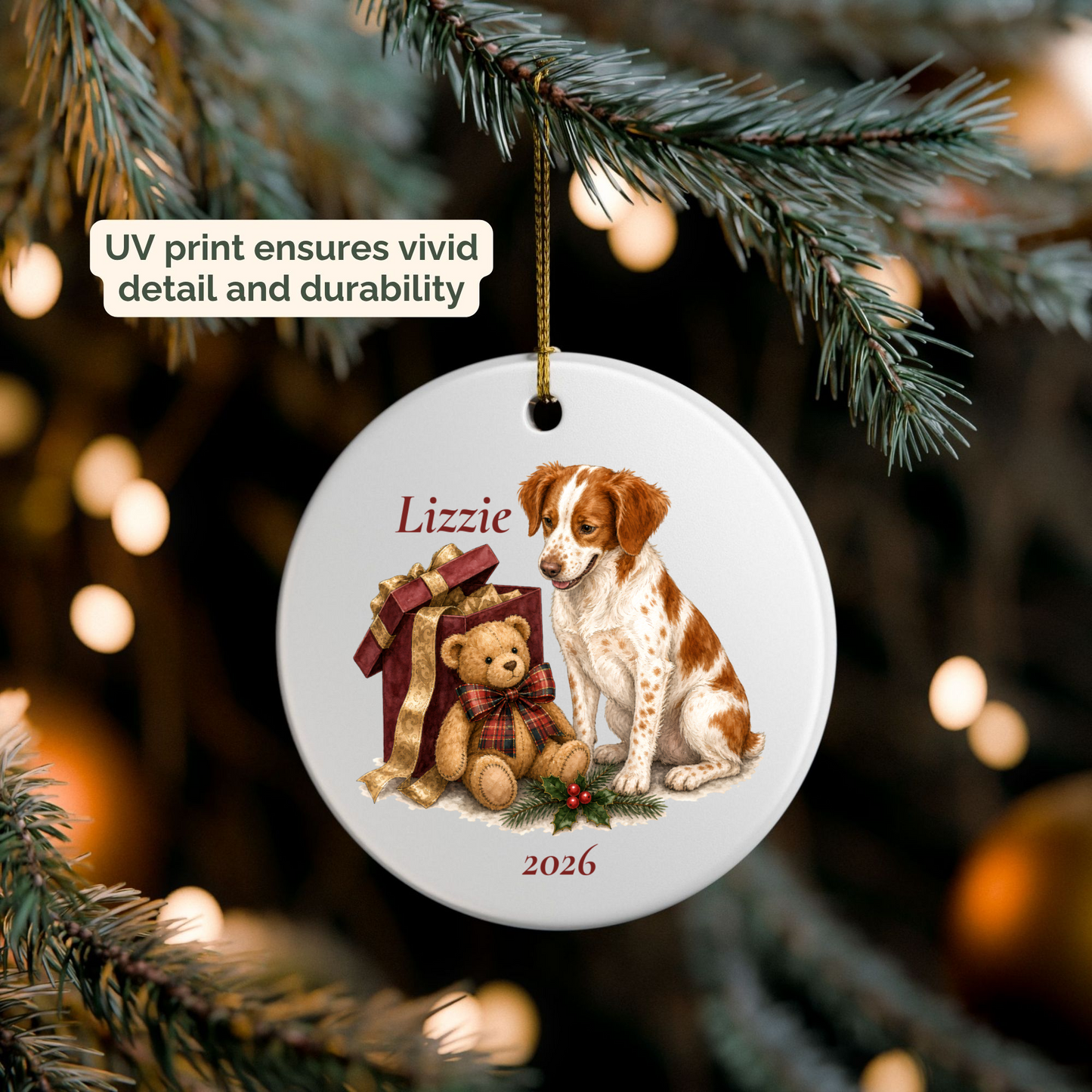 Personalized Brittany Spaniel ornament hanging on a lit Christmas tree