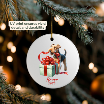 Personalized Airedale Terrier ornament hanging on a lit Christmas tree