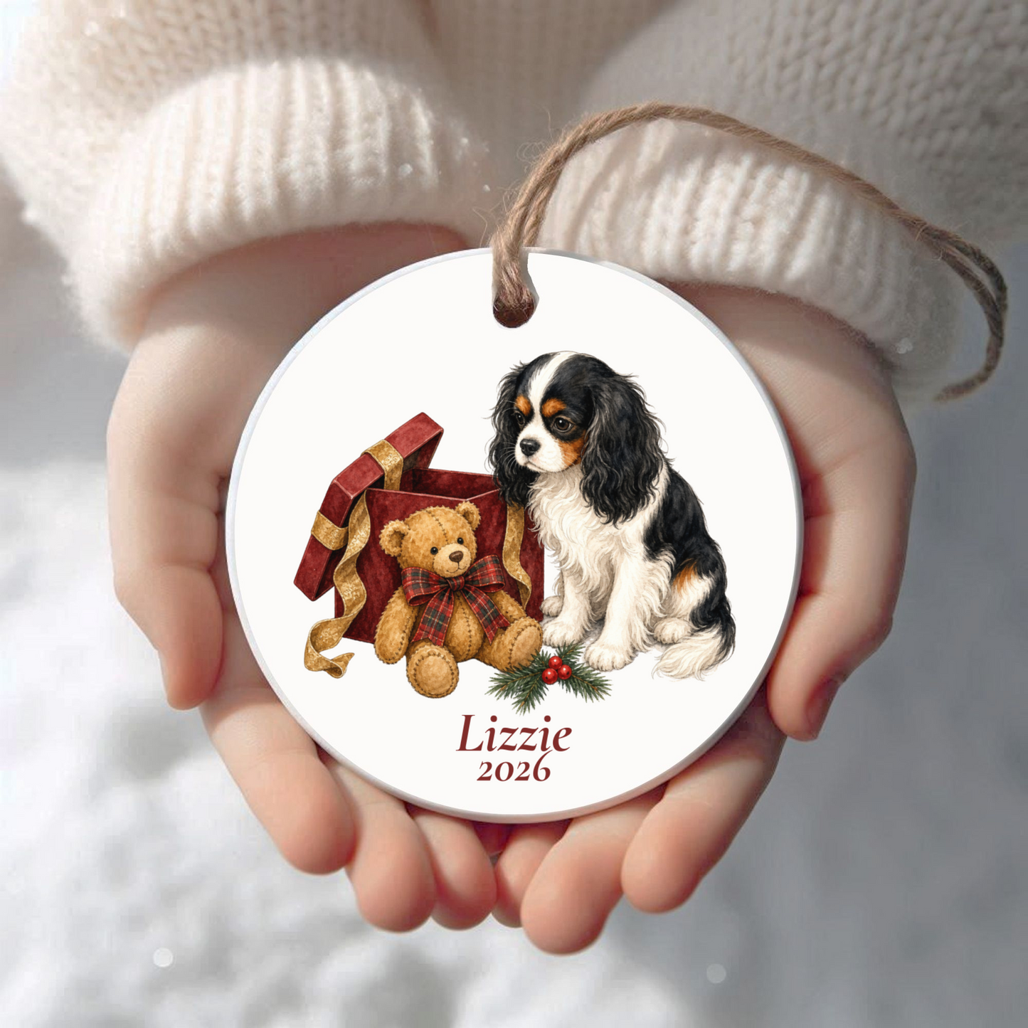 Personalized Cavalier King Charles Spaniel (Tricolor) Christmas ornament held in cupped hands