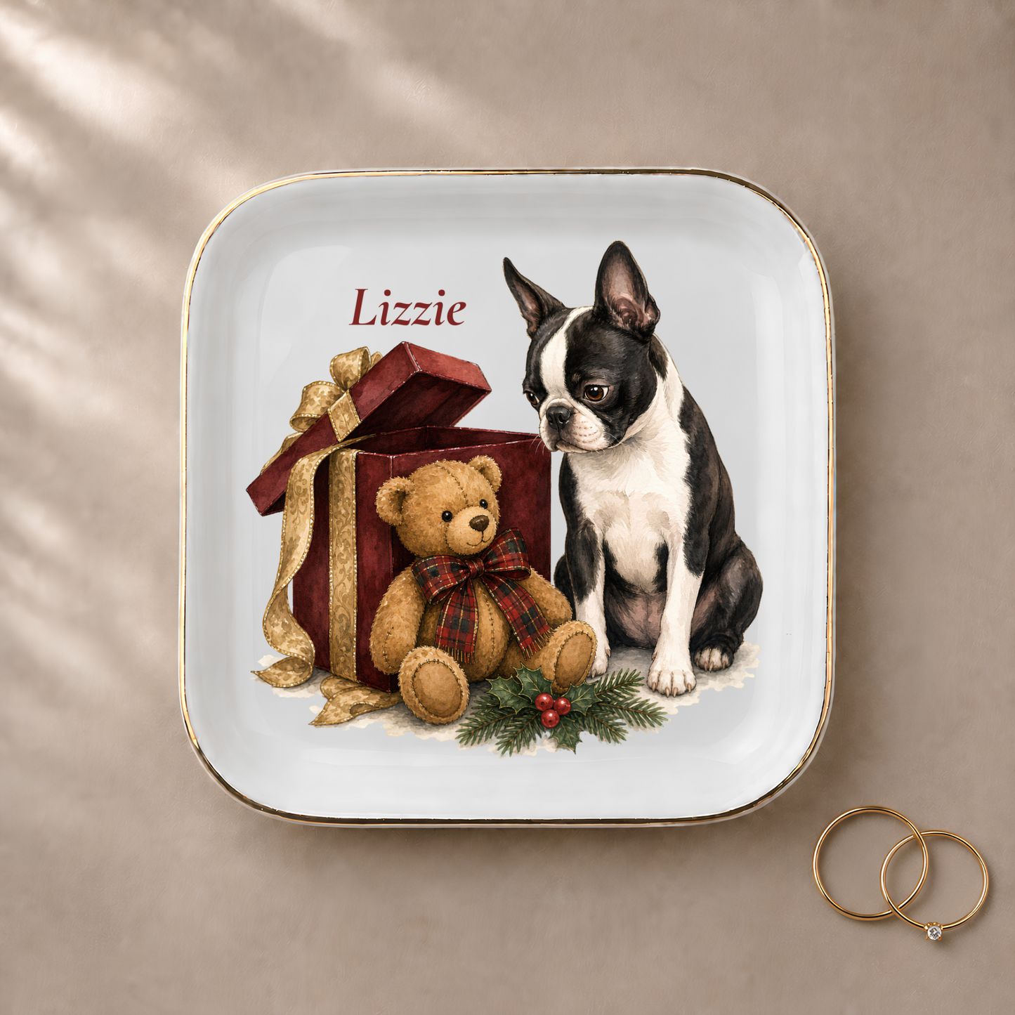 Boston Terrier jewelry dish styled with gold rings and a personalized name
