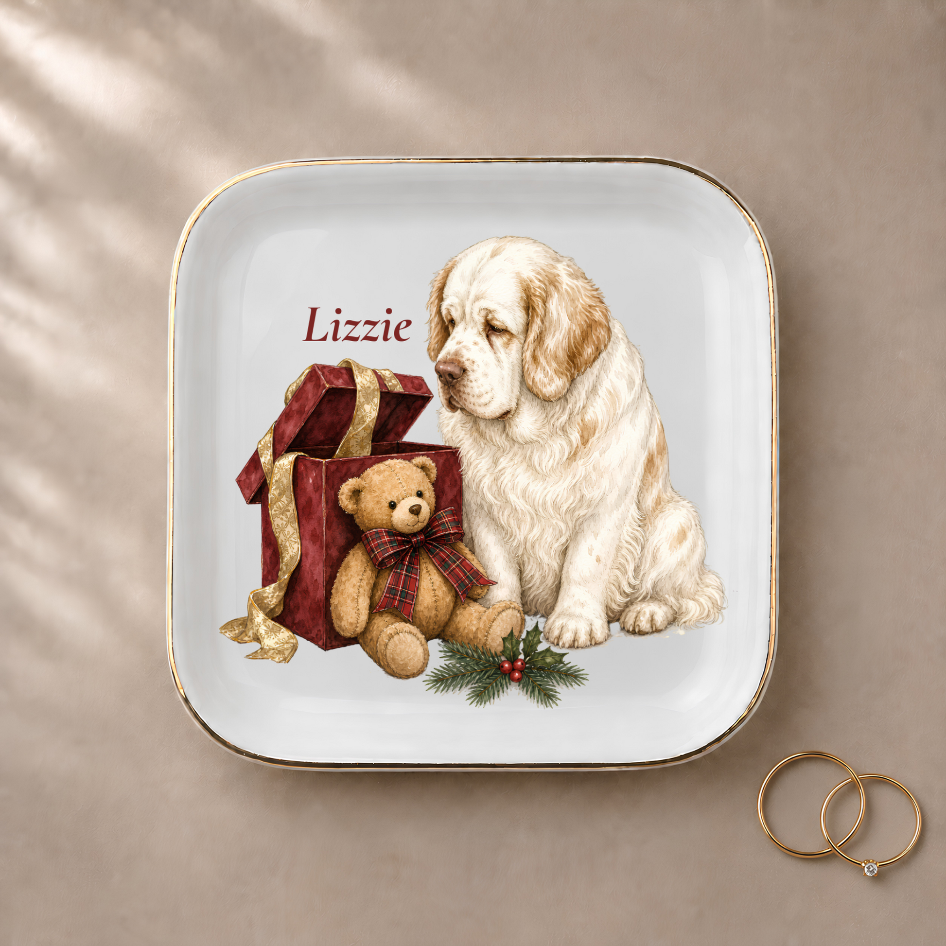 Clumber Spaniel jewelry dish styled with gold rings and a personalized name