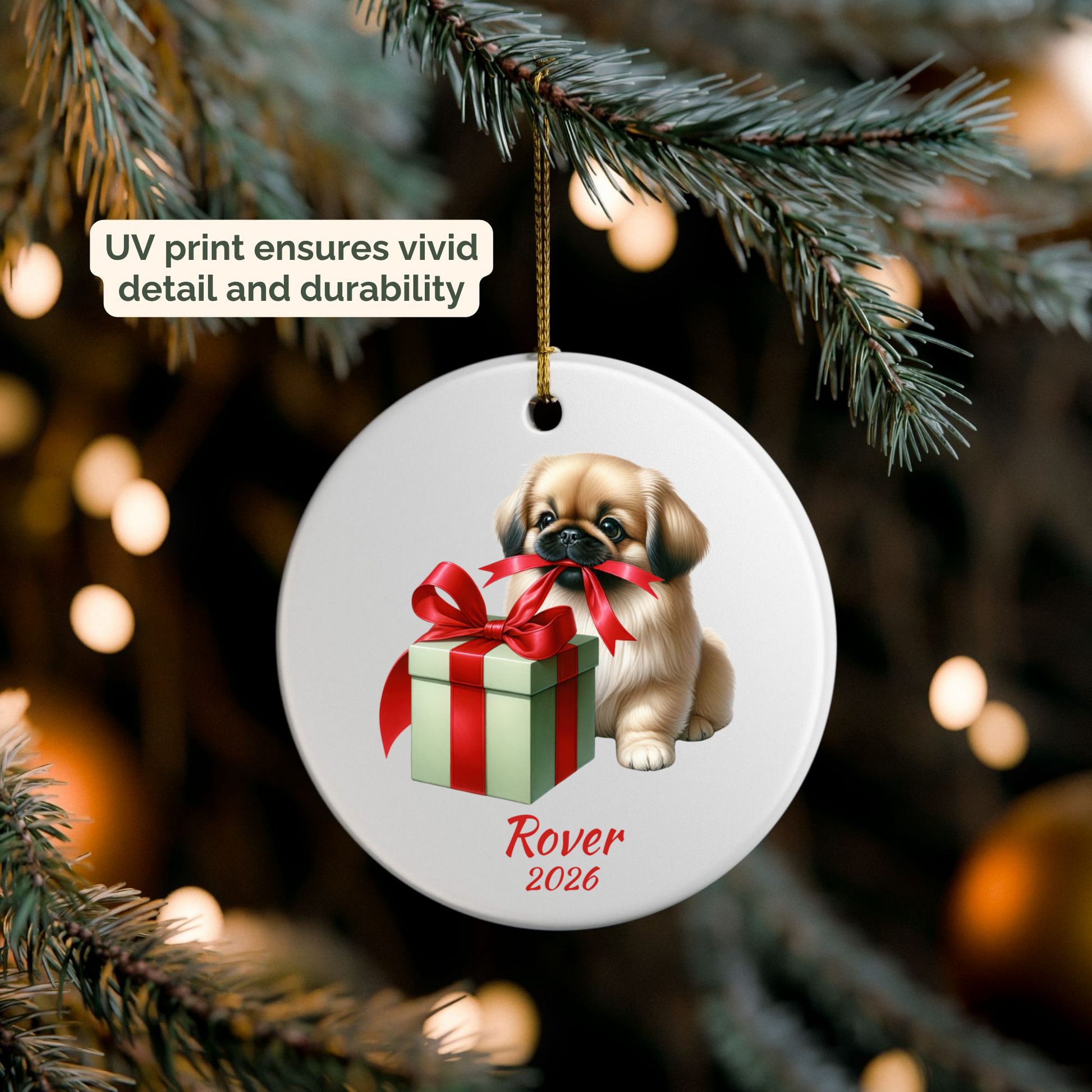 Personalized Pekingese ornament hanging on a lit Christmas tree