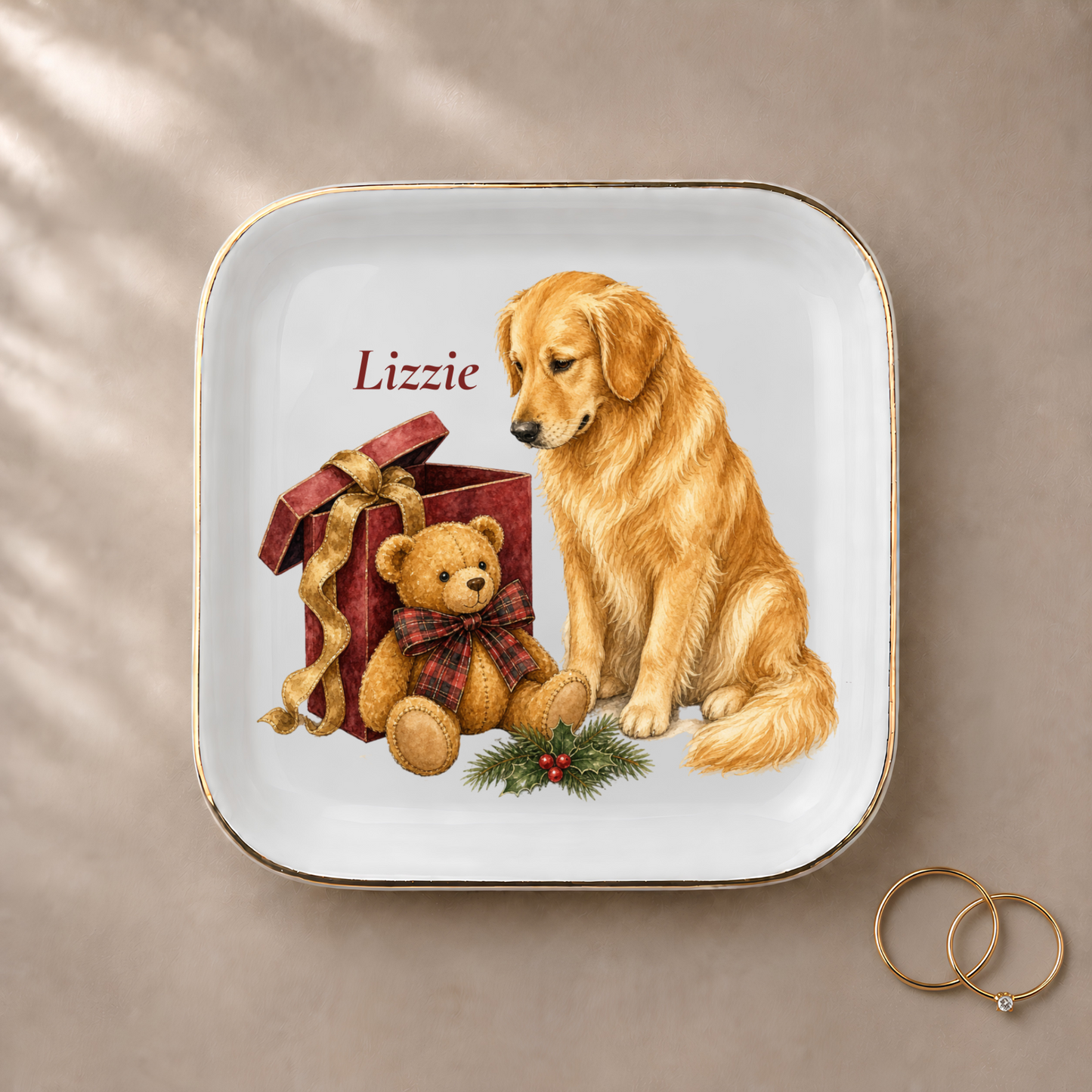 Golden Retriever jewelry dish styled with gold rings and a personalized name