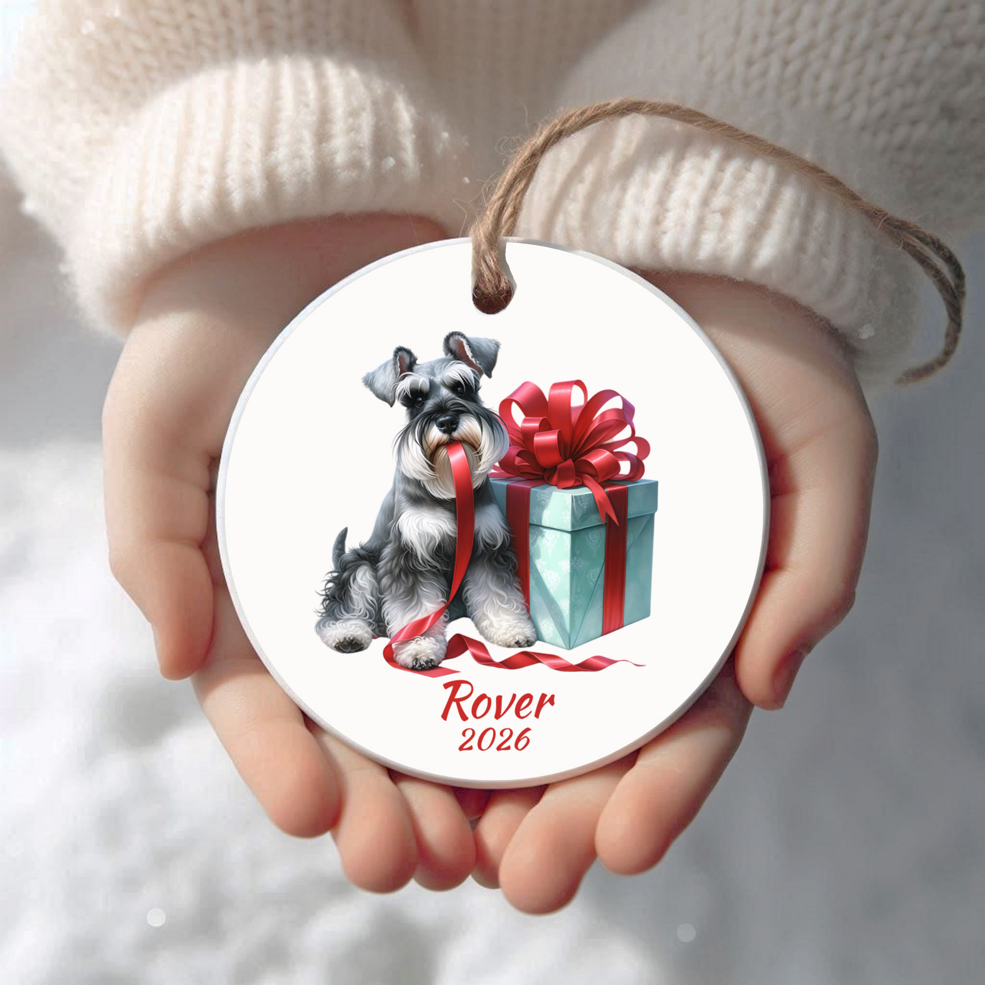 Personalized Miniature Schnauzer Christmas ornament held in cupped hands