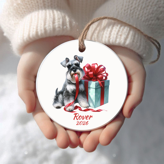 Personalized Miniature Schnauzer Christmas ornament held in cupped hands