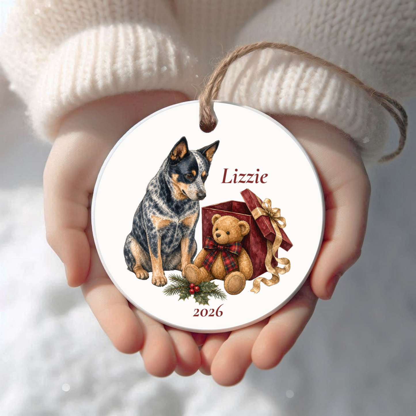 Personalized Australian Cattle Dog Christmas ornament held in cupped hands