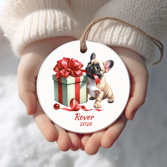 Personalized fawn French Bulldog Christmas ornament held in cupped hands