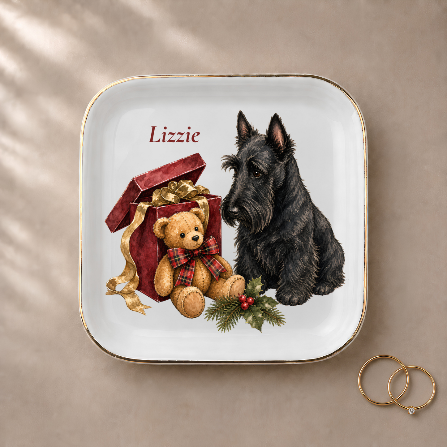 Scottish Terrier jewelry dish styled with gold rings and a personalized name