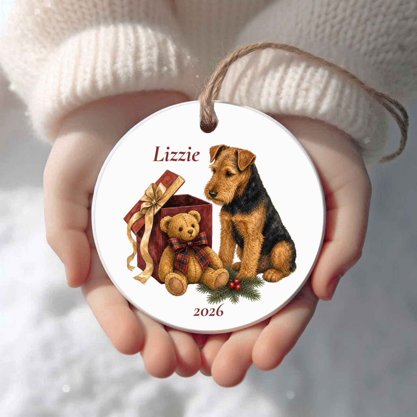 Personalized Welsh Terrier Christmas ornament held in cupped hands