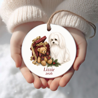 Personalized Maltese Christmas ornament held in cupped hands