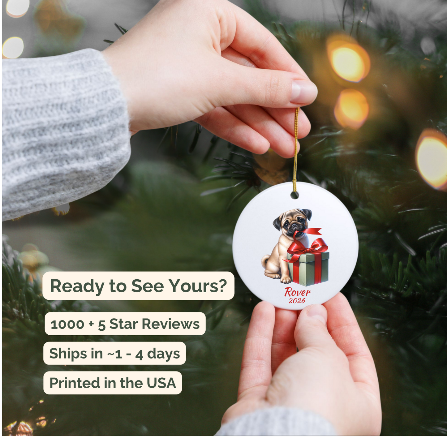 Hand holding a personalized fawn Pug ceramic ornament beside a Christmas tree