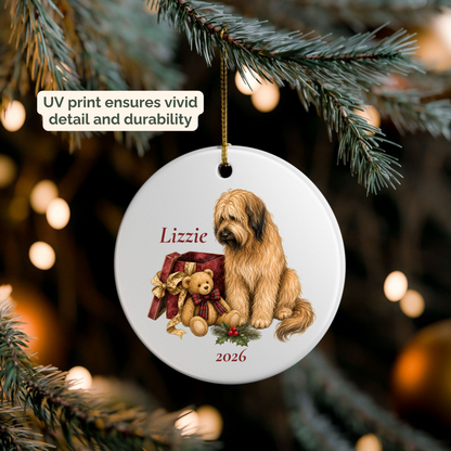 Personalized Briard ornament hanging on a lit Christmas tree