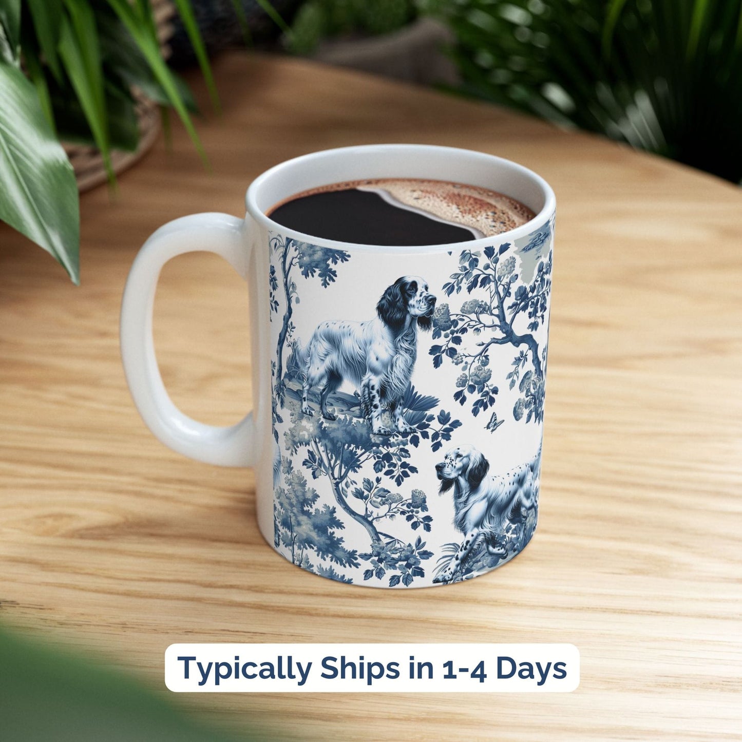 Blue toile English Setter coffee cup styled on a wooden board in a festive setting