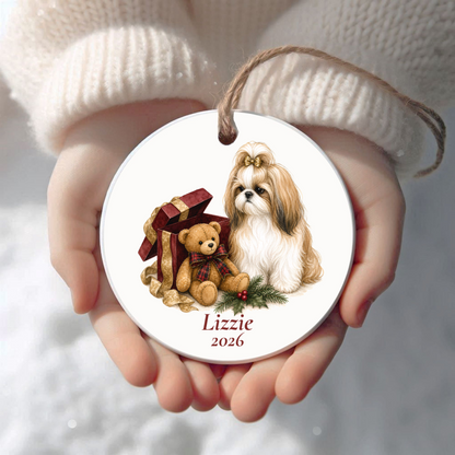 Personalized Shih Tzu wearing a bow Christmas ornament held in cupped hands