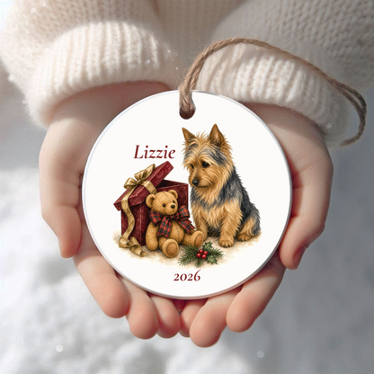 Personalized Australian Terrier Christmas ornament held in cupped hands
