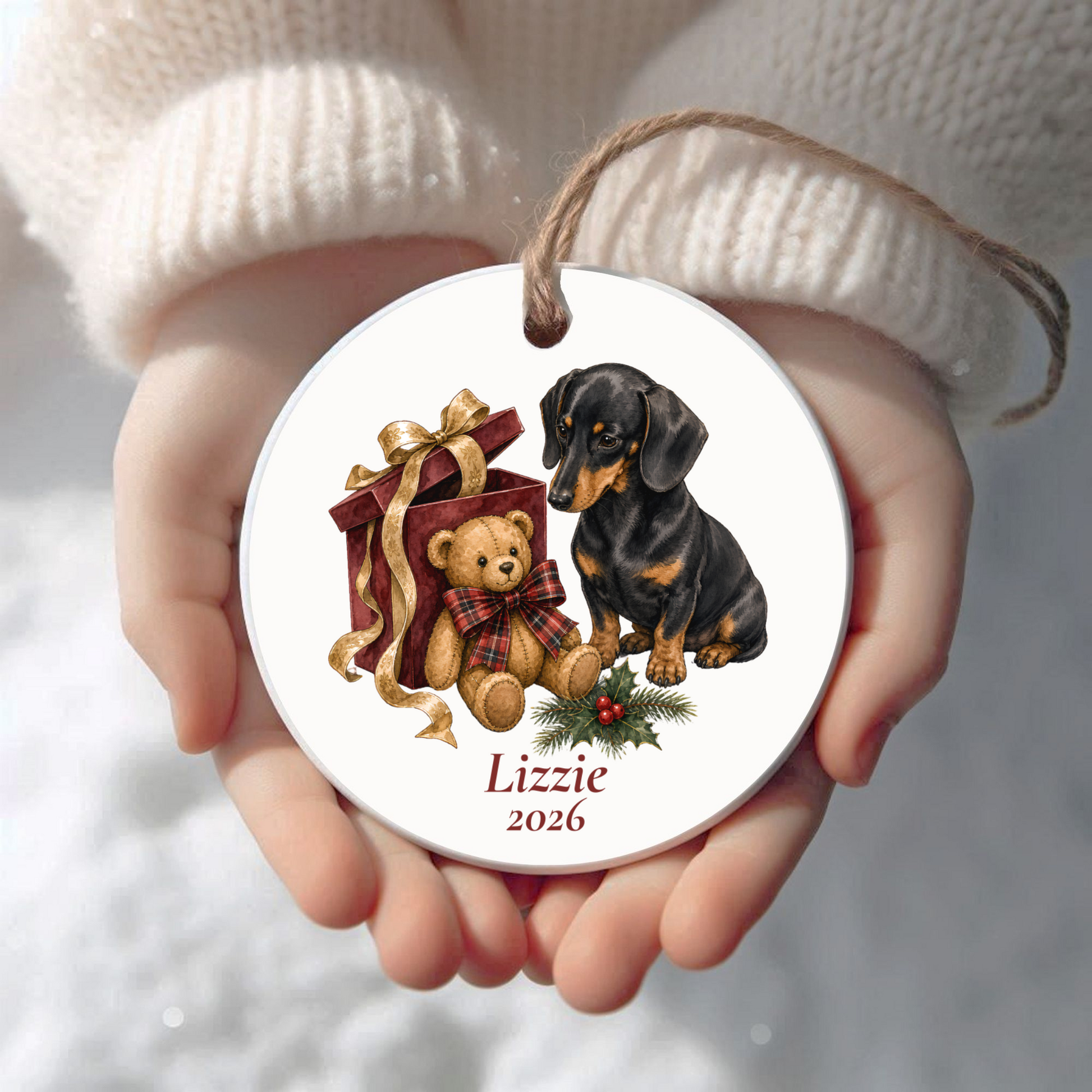 Personalized Dachshund Christmas ornament held in cupped hands