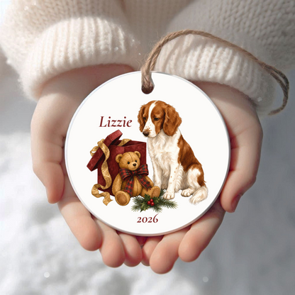 Personalized Welsh Springer Spaniel Christmas ornament held in cupped hands