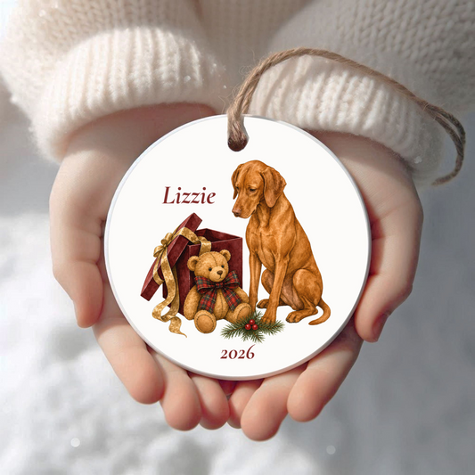Personalized Vizsla Christmas ornament held in cupped hands