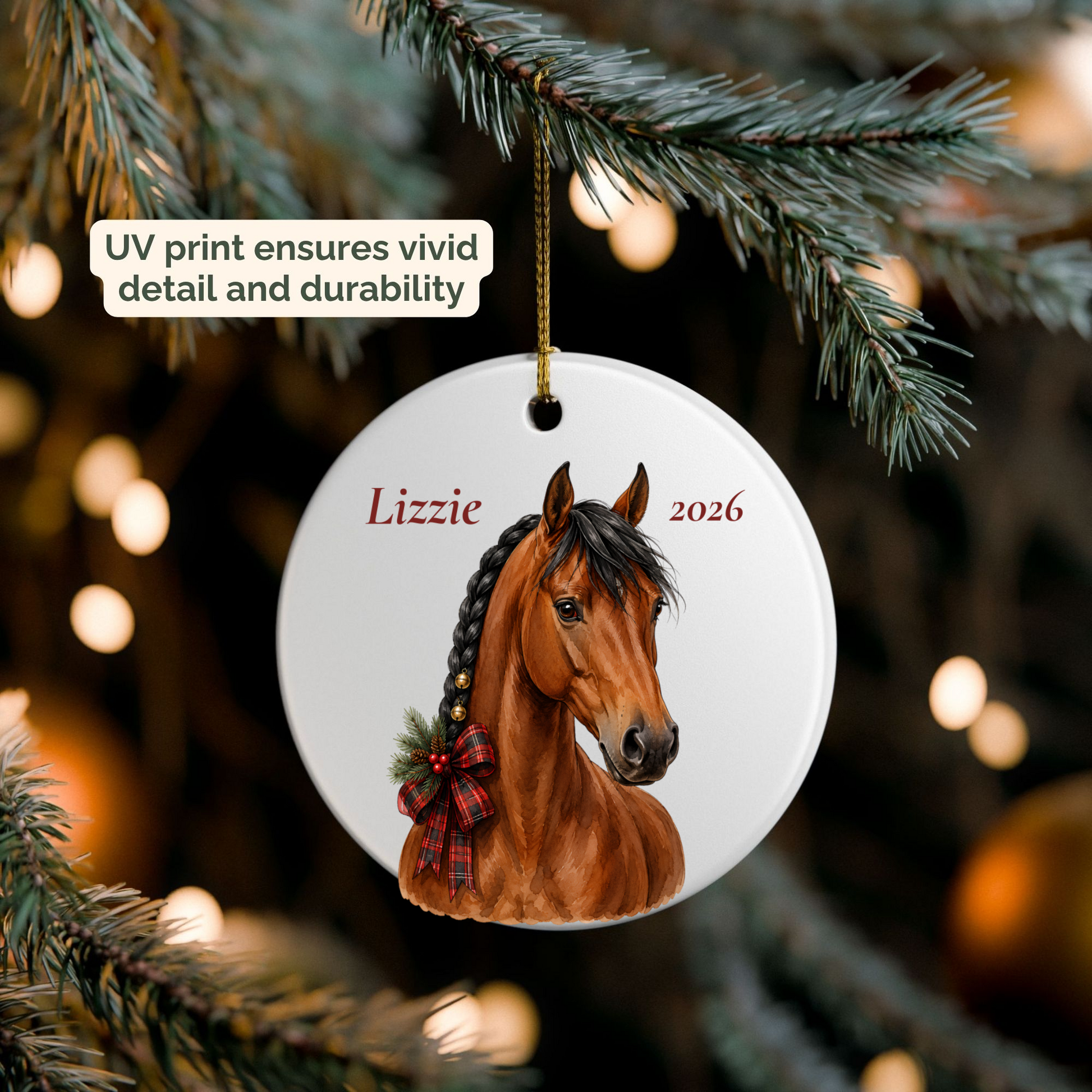 Personalized bay horse ornament hanging on a lit Christmas tree