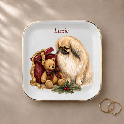 Pekingese jewelry dish styled with gold rings and a personalized name