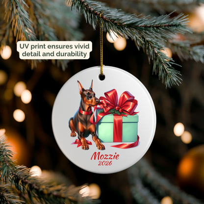 Personalized red Doberman Pinscher ornament hanging on a lit Christmas tree